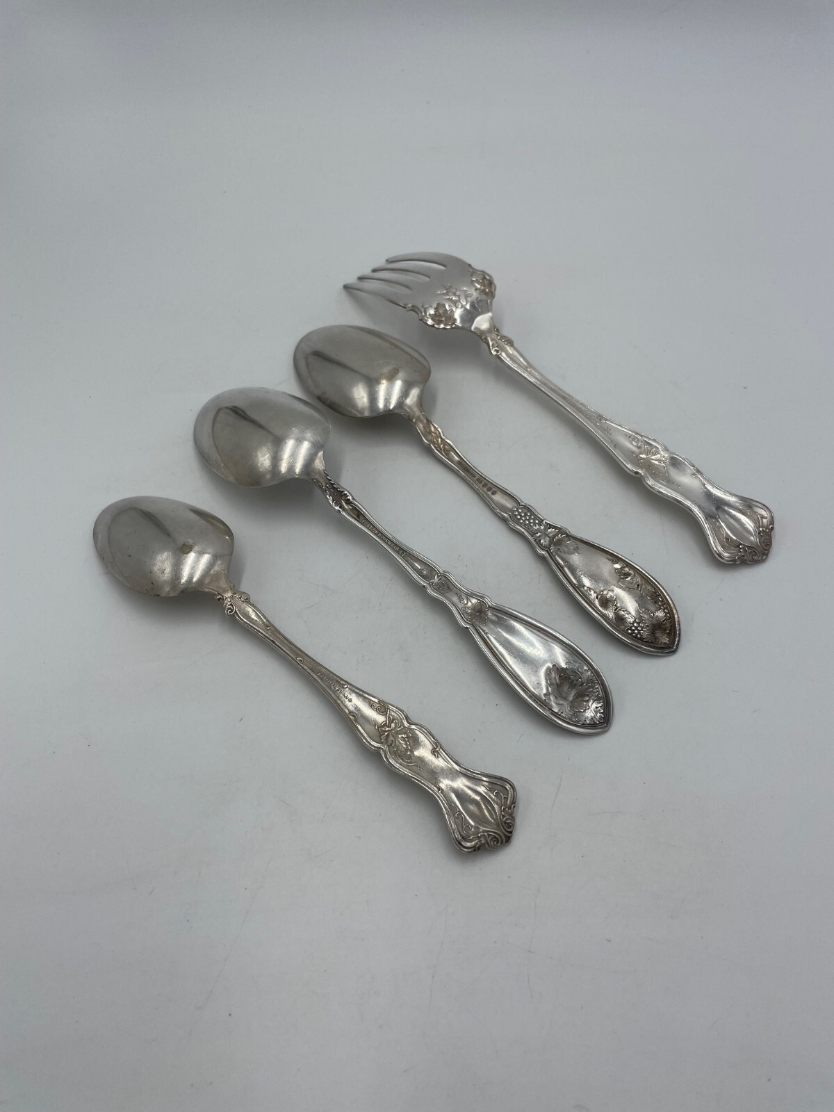 4 Piece Rogers Silverplate Mixed Grape Pattern 3 Serving Spoons 1 Meat Fork