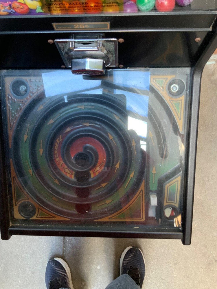 Spiral gumball launcher