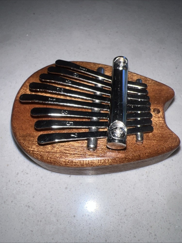 Mini 8 Key Thumb Piano Portable Beginners Finger Piano EUC