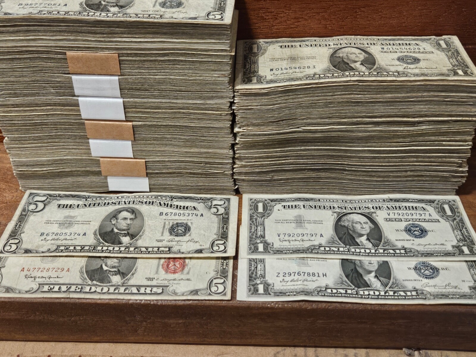 4 notes. 1953 Red Seal $5, $5 Silver cert, 1953 $1, 1935 $1 silver certificate