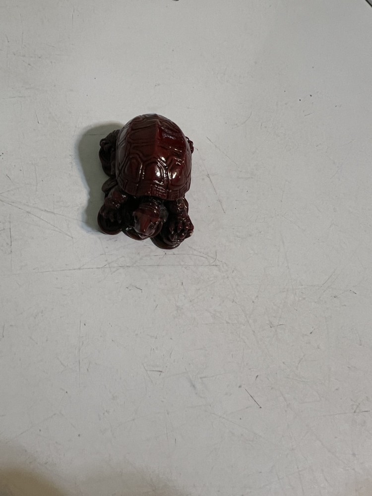 Tiny unique red brown turtle figurine