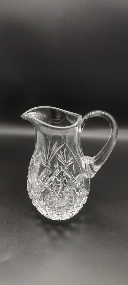 Crystal Pitcher.  8" Tall. Unsigned. Very Clear Crystal with a Beautiful Design.