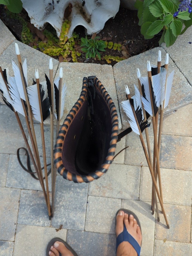 Leather Arrow Carrier With 11 Arrows.