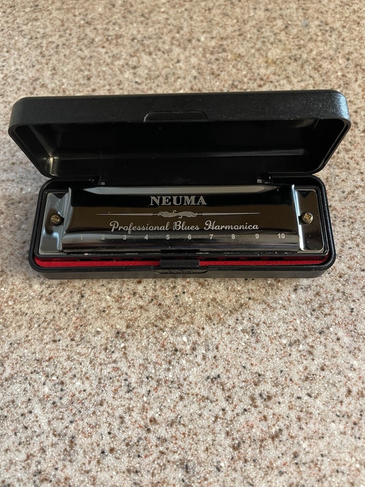 Neuma 10-Hole Blues Harmonica in a protective case