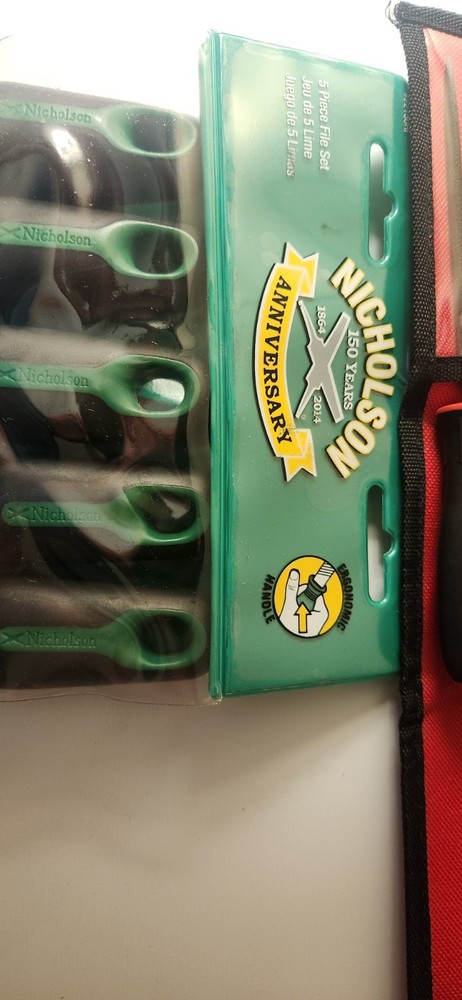 2 file sets and a cleaning brush for them