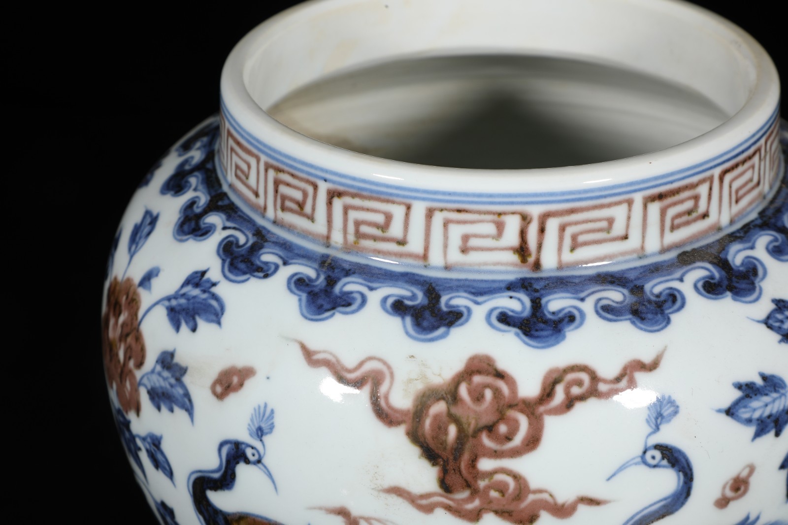 An Iron Red Blue & White Porcelain Jar with lid. 'xuanDe' mark