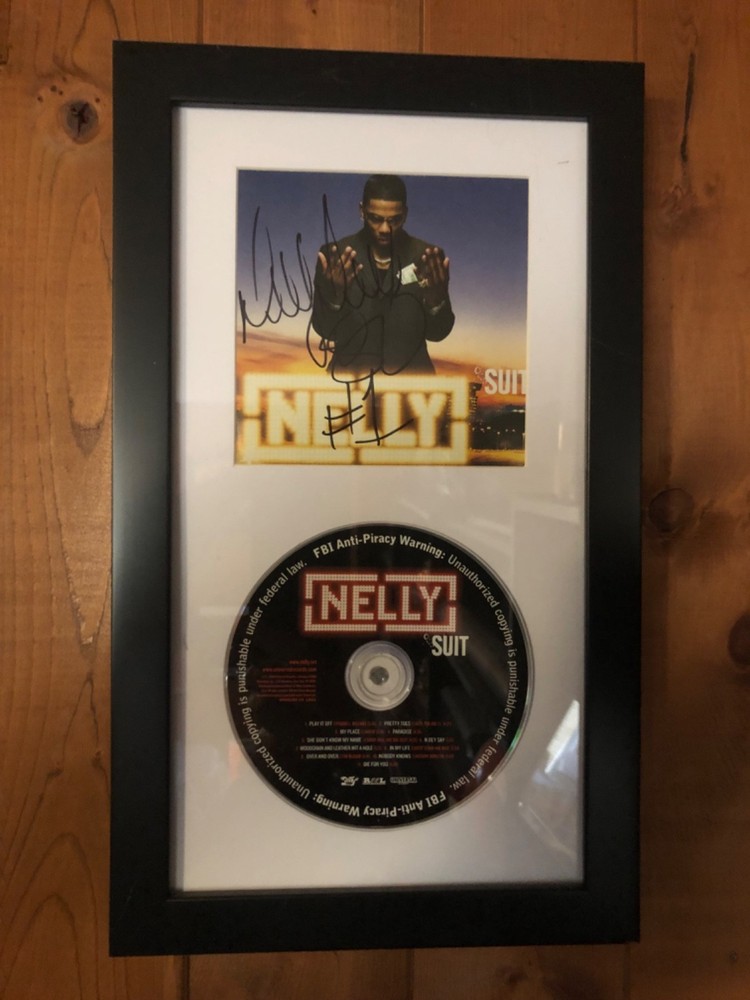 Autographed Nelly CD Display