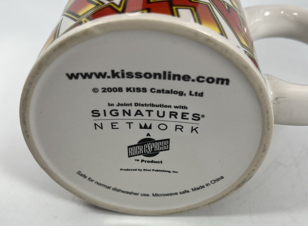 Rock Express KISS Band Orange Yellow Logo Coffee Mug Catalog Ltd 2008