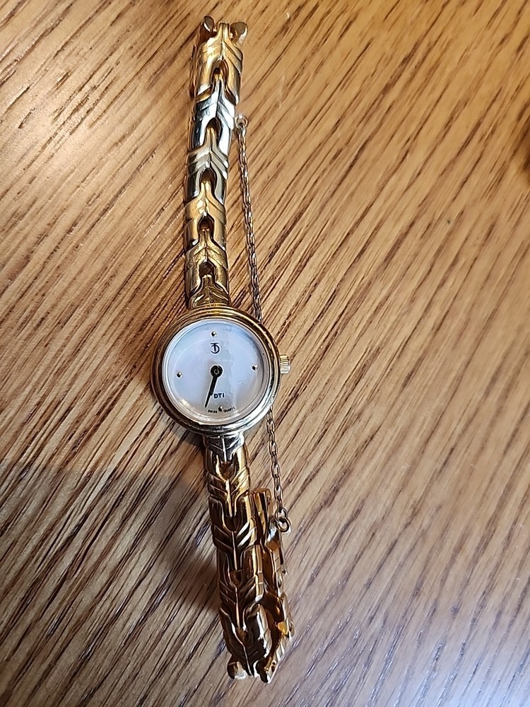 DTI Swiss  Quartz Watch.  Needs Battery