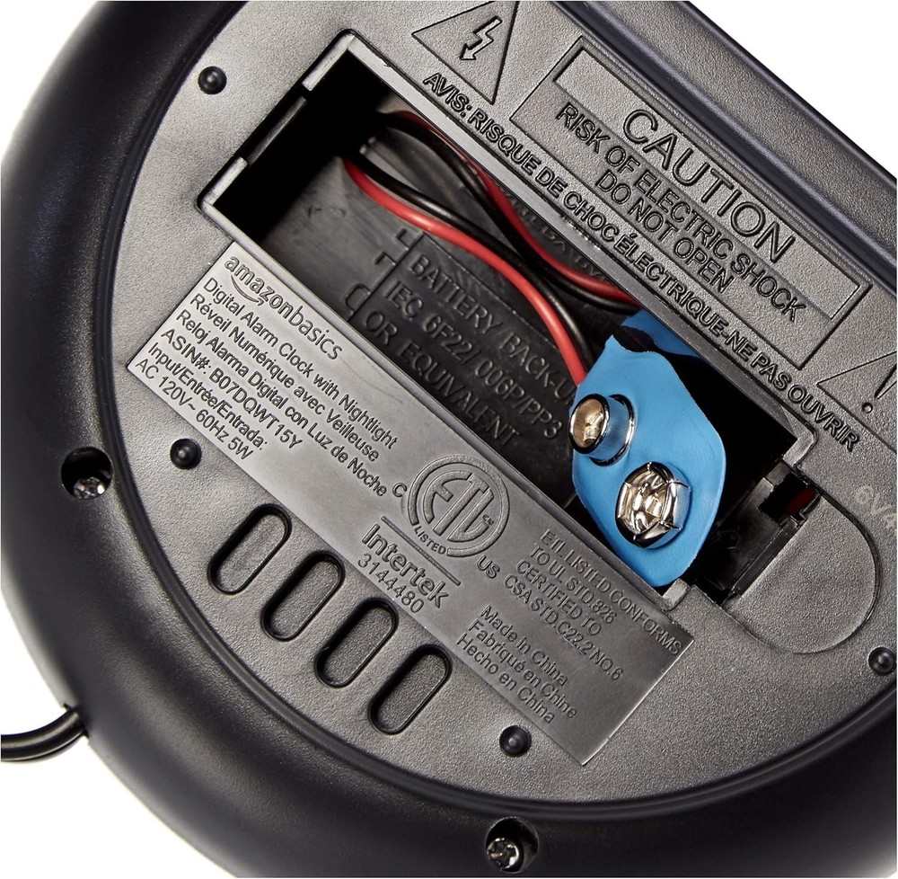 Compact Oval Black Digital Alarm Clock with LED Display & Snooze Functionality