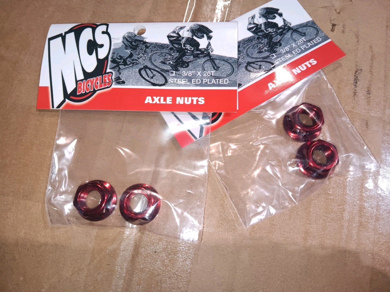 MCS Red Chromoly Flanged Axle Nuts 3/8"x26t Set of 4