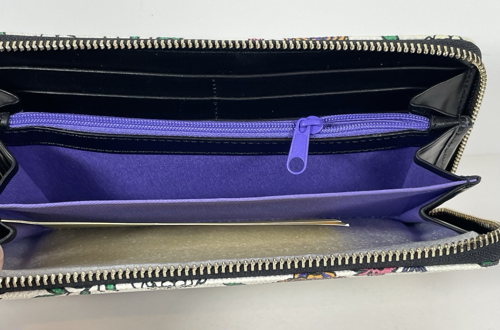 Dooney & Bourke Disney Coco - Miguel Wristlet Wallet - Exact Placement