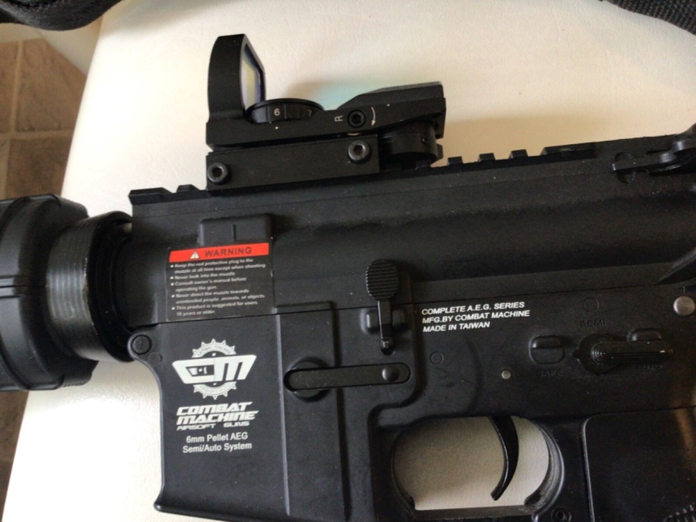 Combat Machine Airsoft 6mm pellet AEG semi/auto system with red dot scope