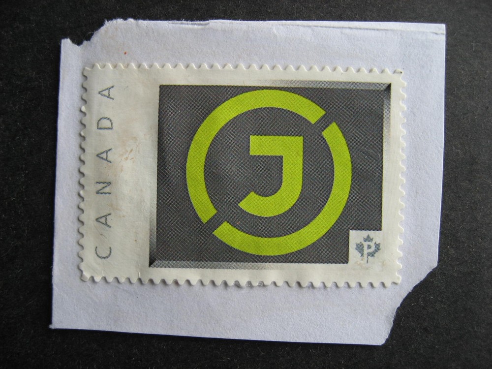 Canada Post personalized postage stamp postally used but very manually glued on