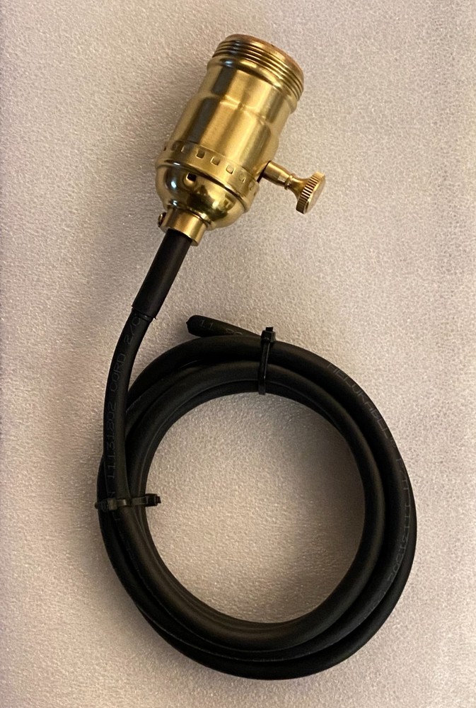 SOLID BRASS REPLACEMENT SOCKET FOR THE DELTA 882 RETIREMENT WORK LIGHT.