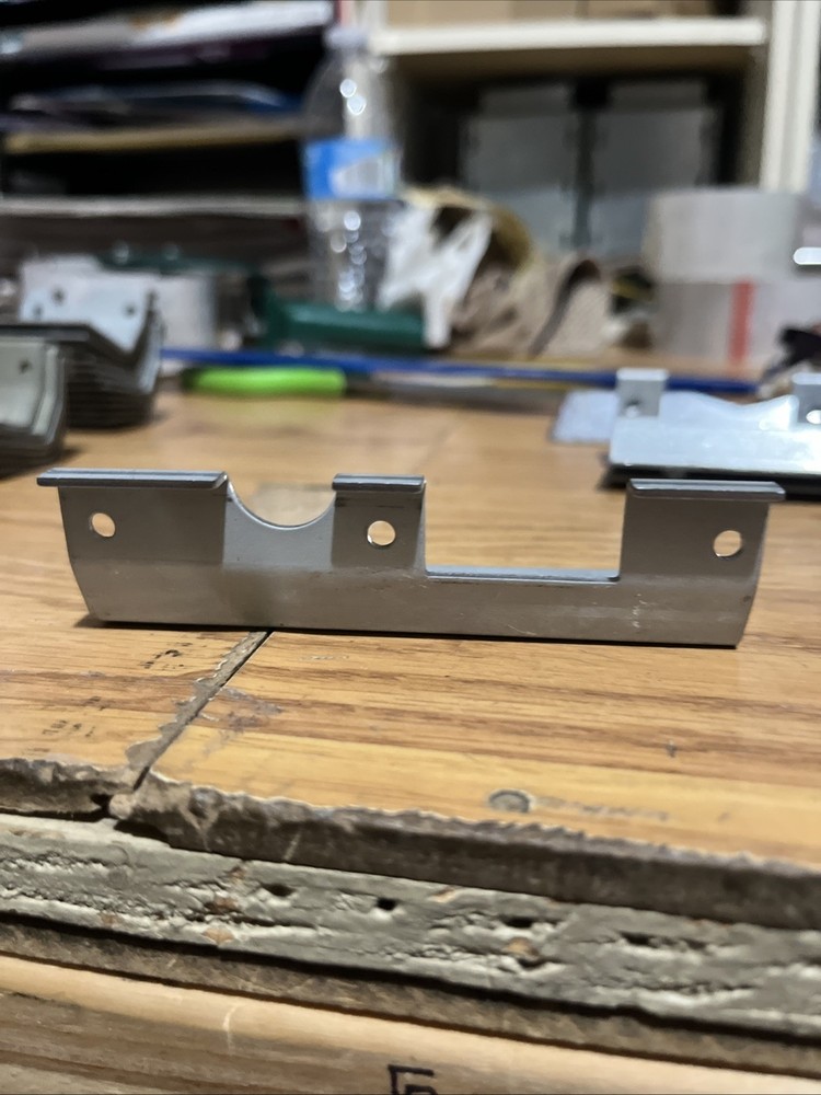 Igt coin in mounting bracket