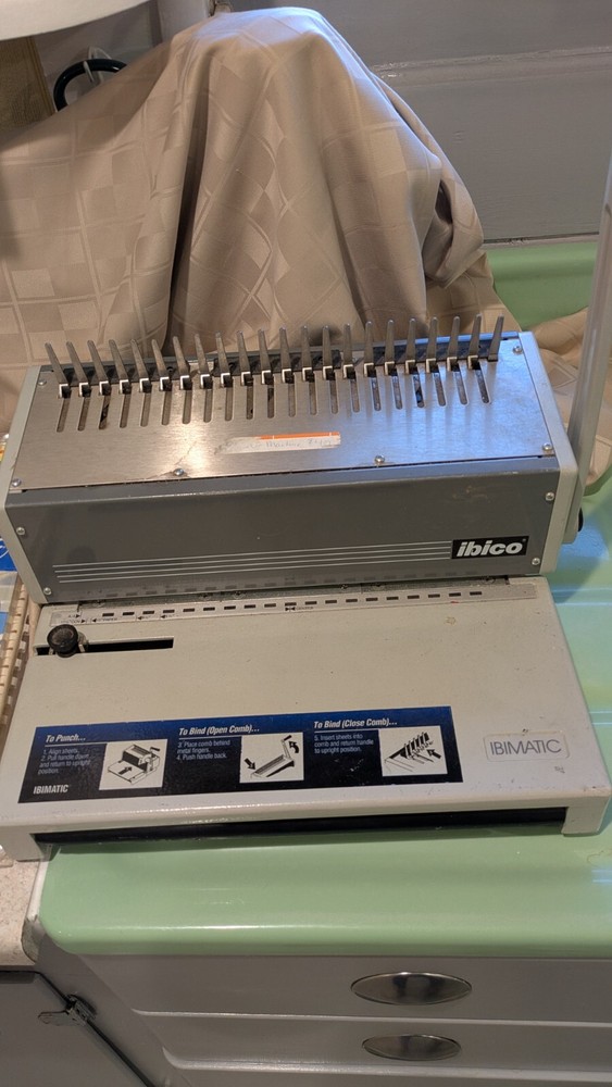 Ibico office machine for binding with two packages of combing material.