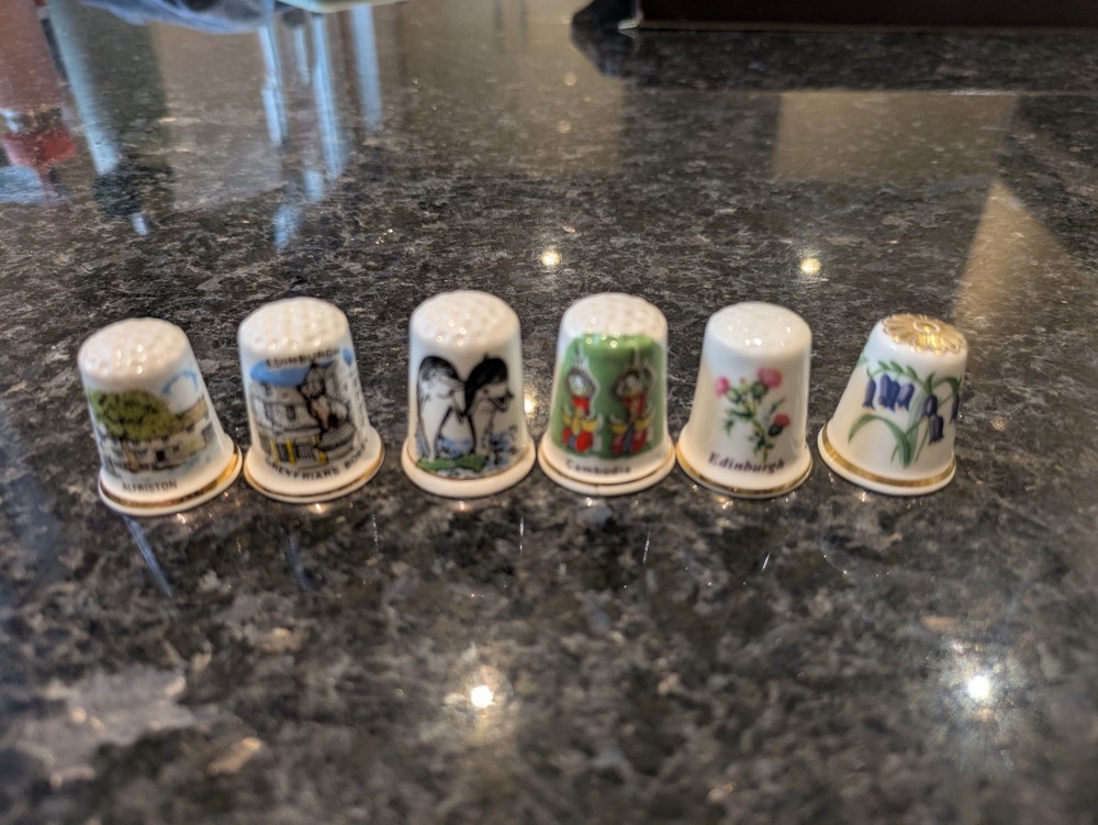 48 Decorative Thimbles in Display Case