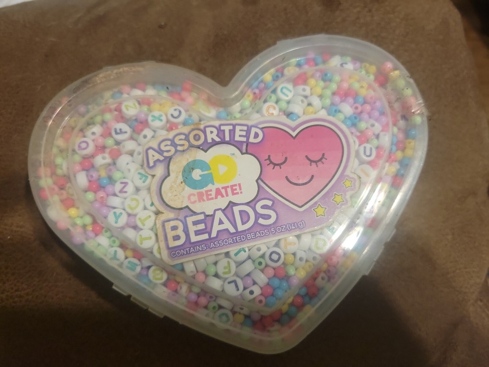 Assorted Go Create Beads free ship 5 Oz pkg is dirty but unopened. Free ship
