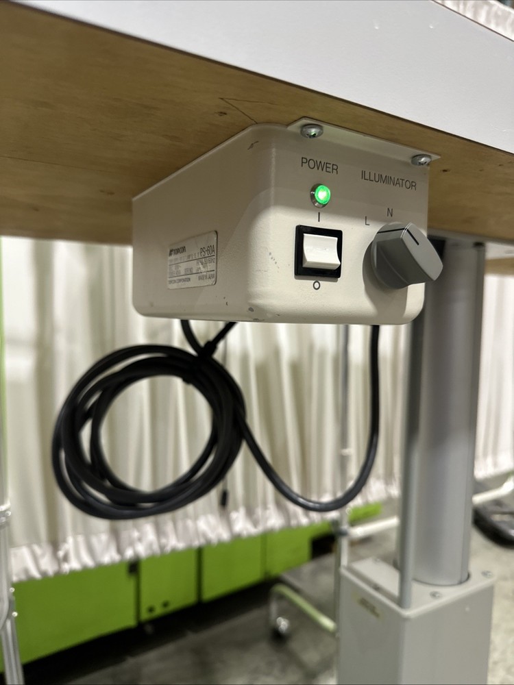 Essilor SL300 Slit Lamp With Franklin Automatic Table