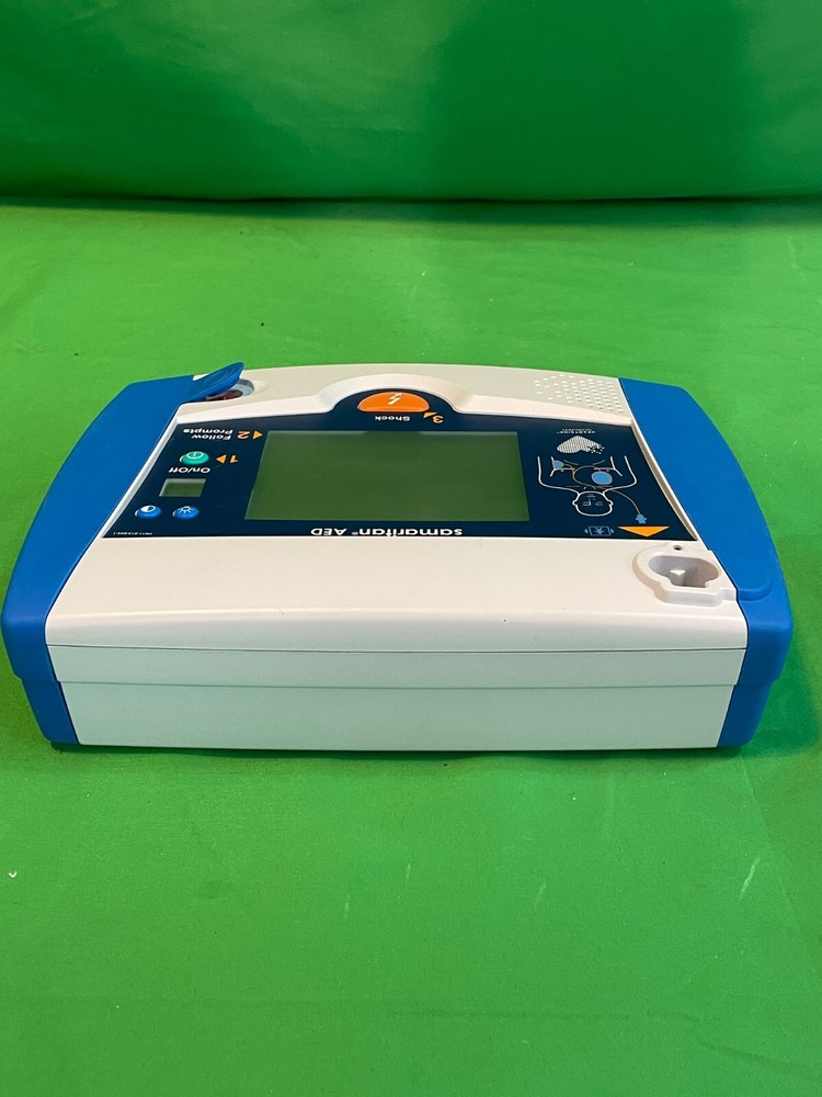 HEARTSINE Samaritan AED with accessories shown *battery dead* (H2-E)