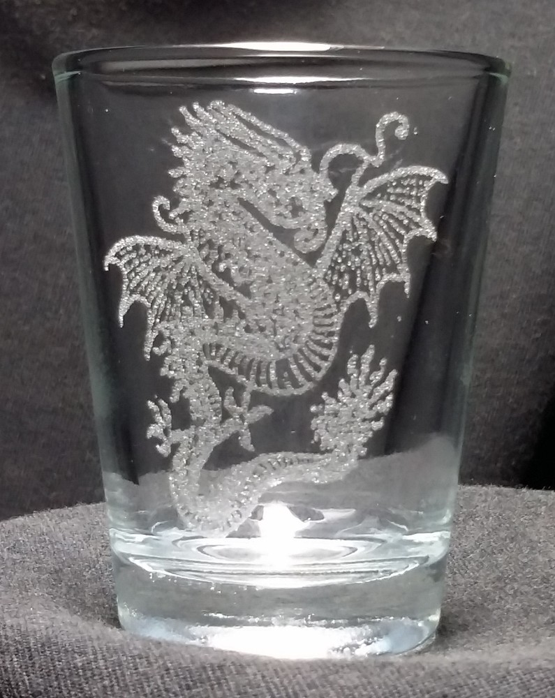 Dragon etched shot glass. Can be personalized. Different designs available!!