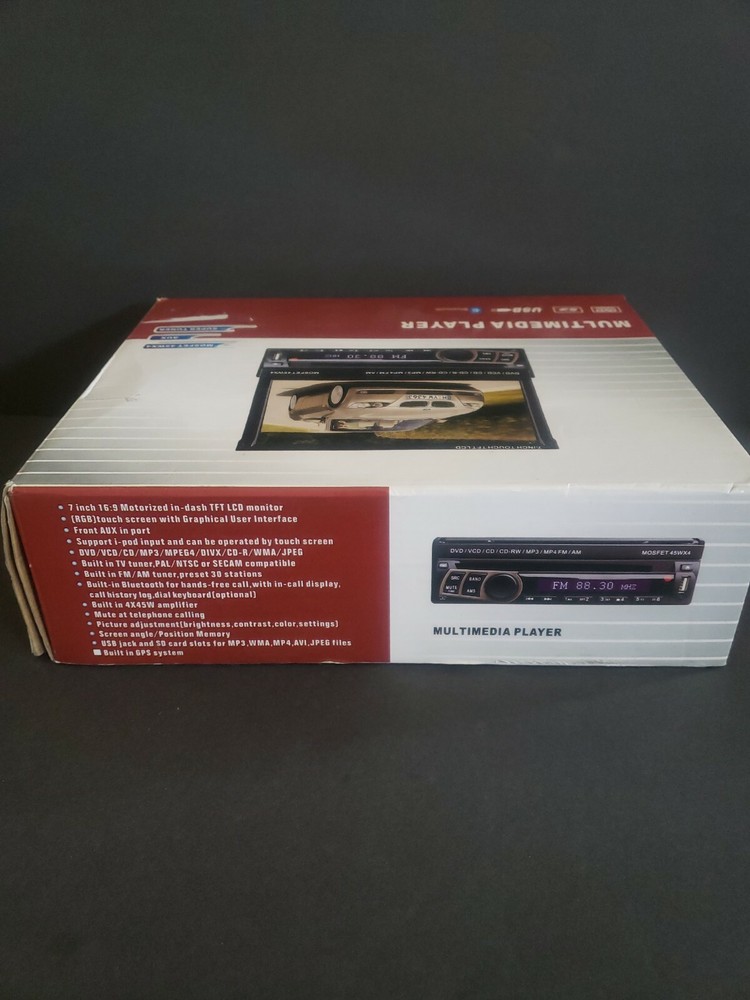 Auto multimedia player. New open box. 7" touch screen. See description