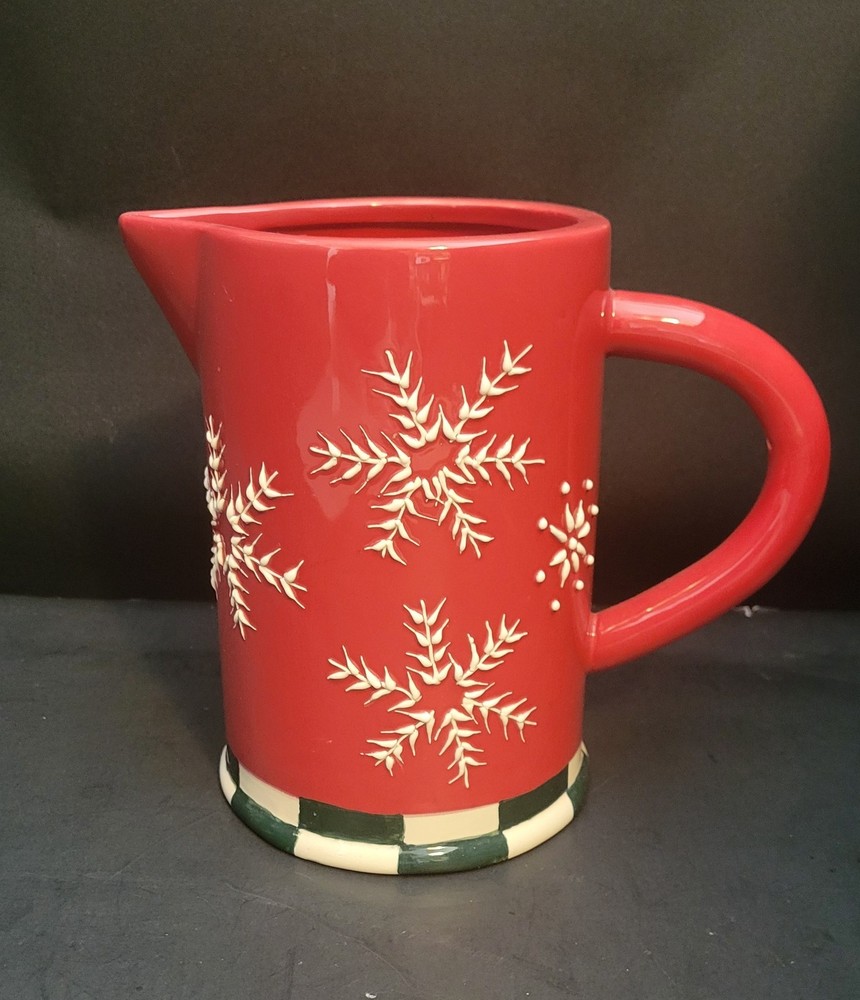 Red Ceramic Pitcher with Snowflake and Green and White checked base.