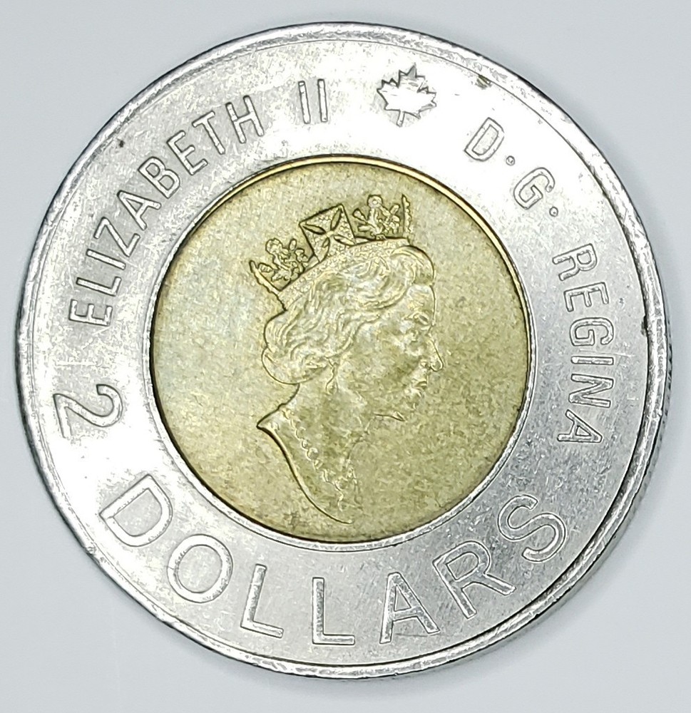 2000 Canada $2 Toonie “Knowledge” Bi-Metallic Rim Shift & Strike Traits