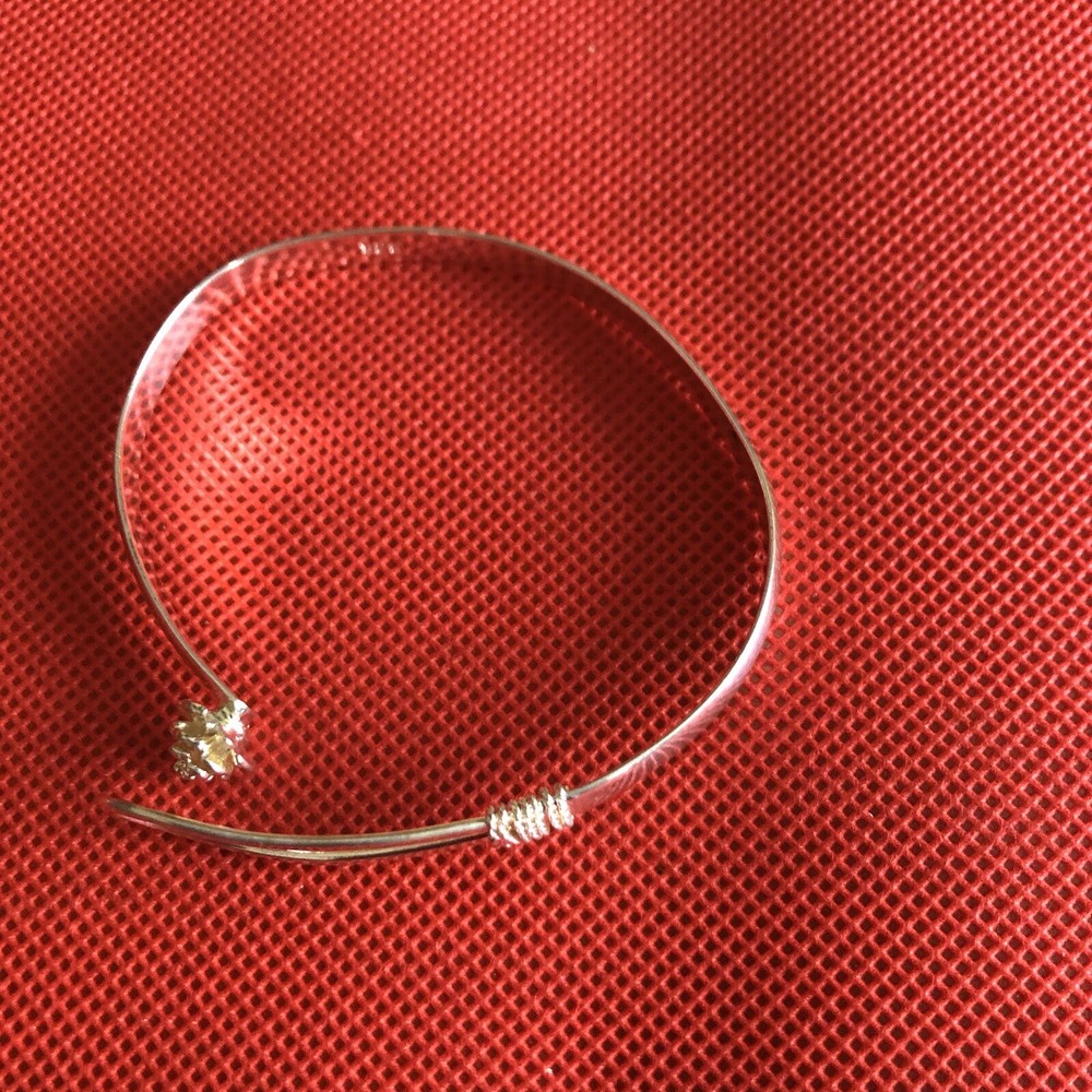 Silver Bangle With A Rose Fixture