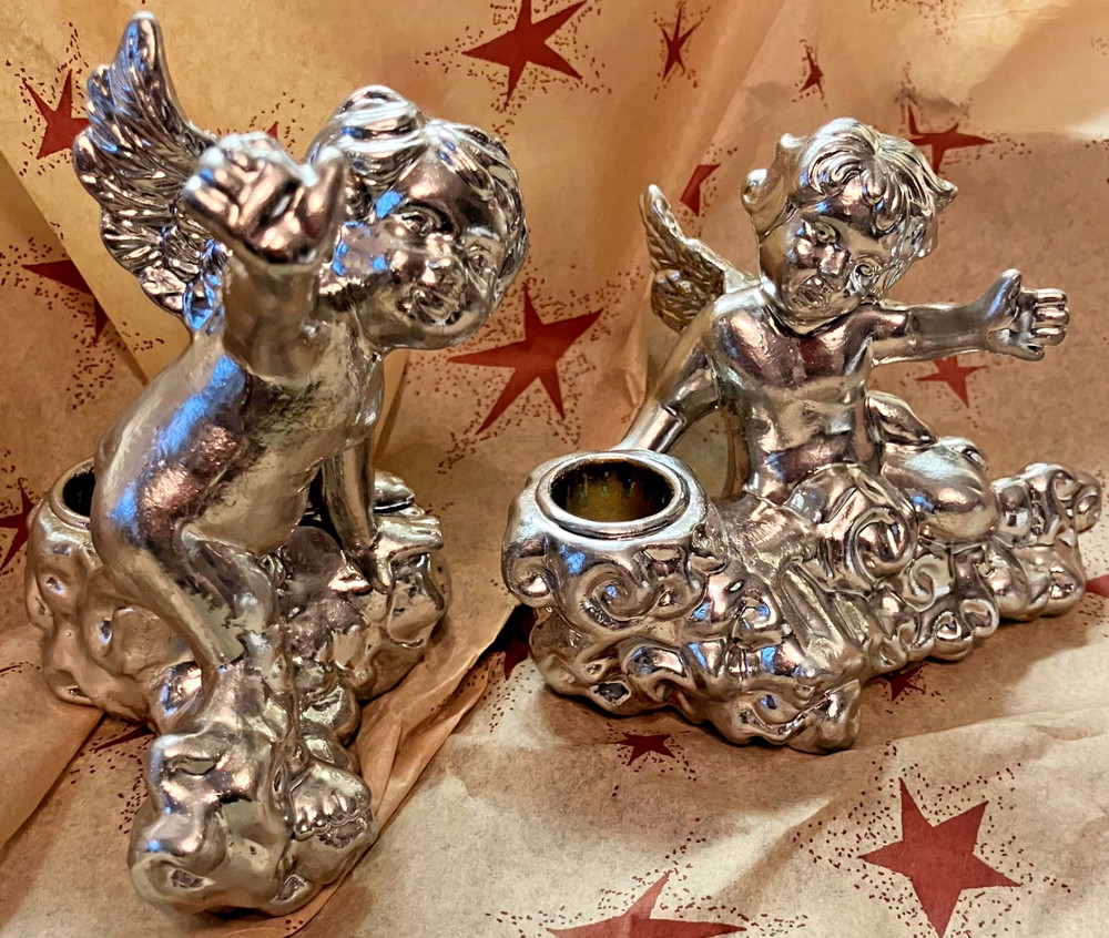 Two Silver Colored Ceramic Baby Cherub Candlestick Holders