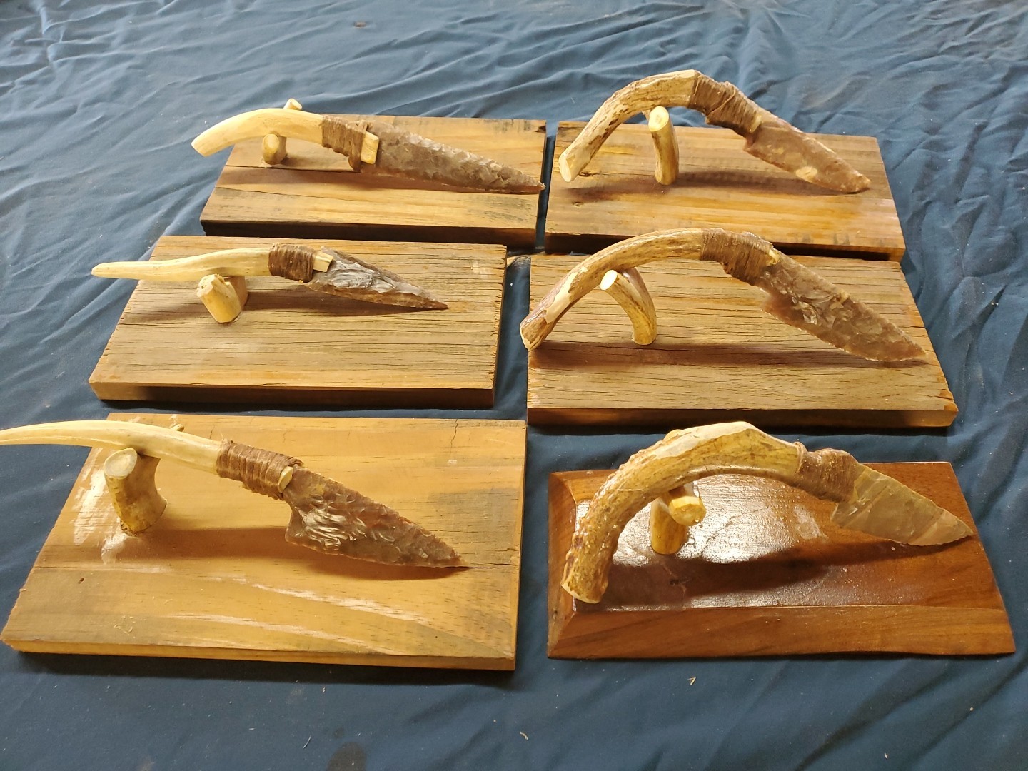 Flint Knapped  Stone Arrowhead Blade Knife with Deer Antler Handle on Wood Stand