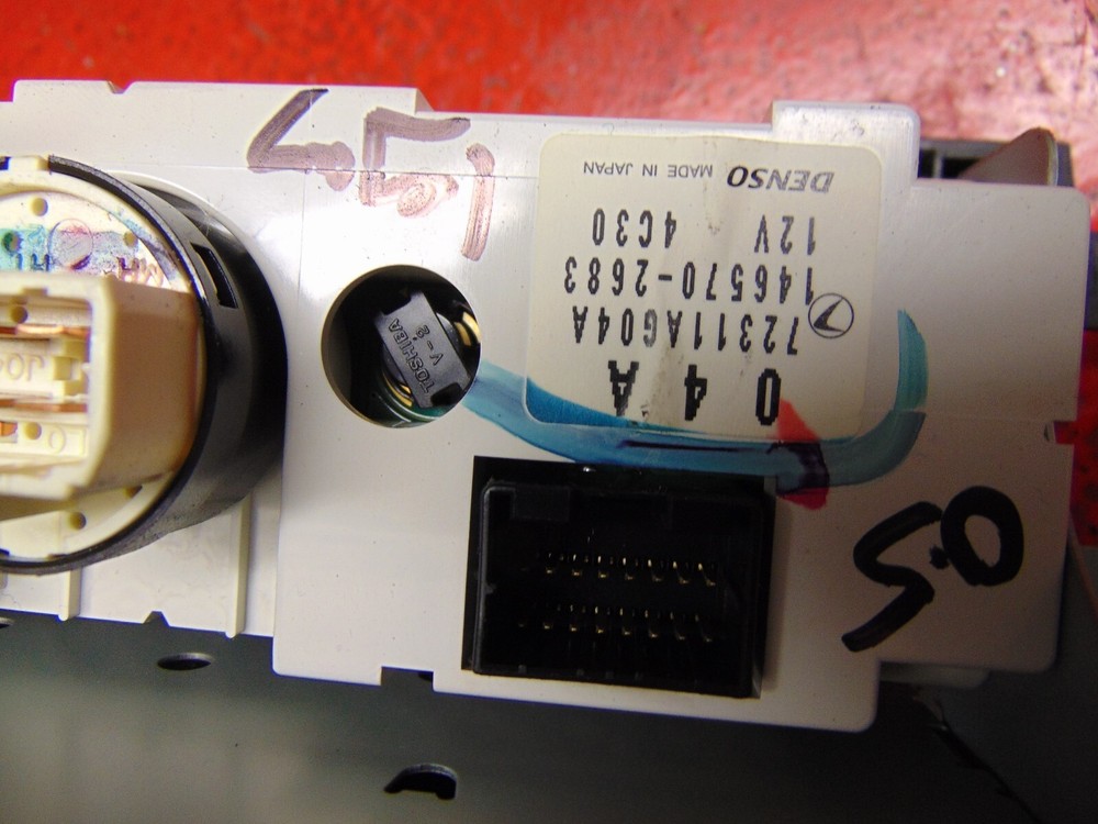 06 05 Subaru Legacy outback cd player changer & climate control switch unit