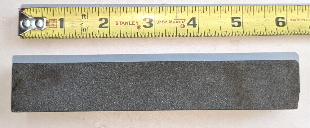 Vintage sharpening stone maybe natural stone , used