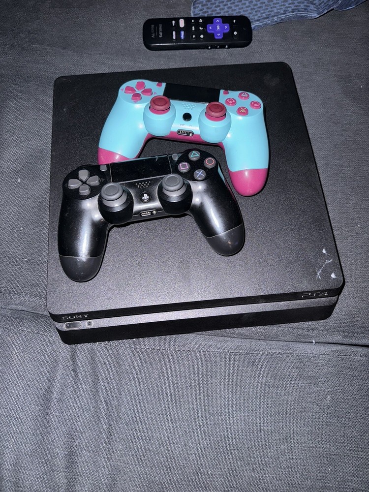 Used PlayStation 4 Console with 2 Controllers Included