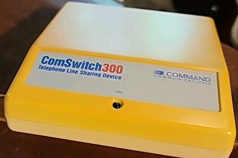 ComSwitch 300 Telephone Line Sharing Device, Command Communications