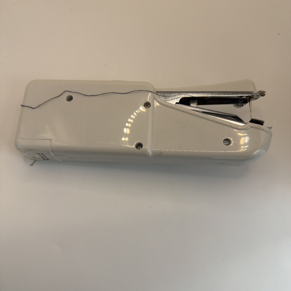 Handy Stitch The Handheld Sewing Machine