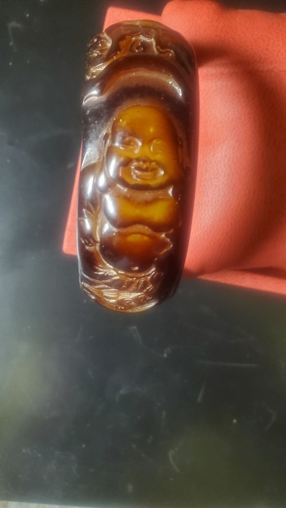 Rare Buddah bakelite carved bangle bracelet