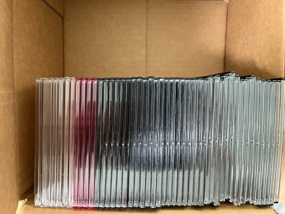 Case of 46 loose CD/DVD Cases Empty