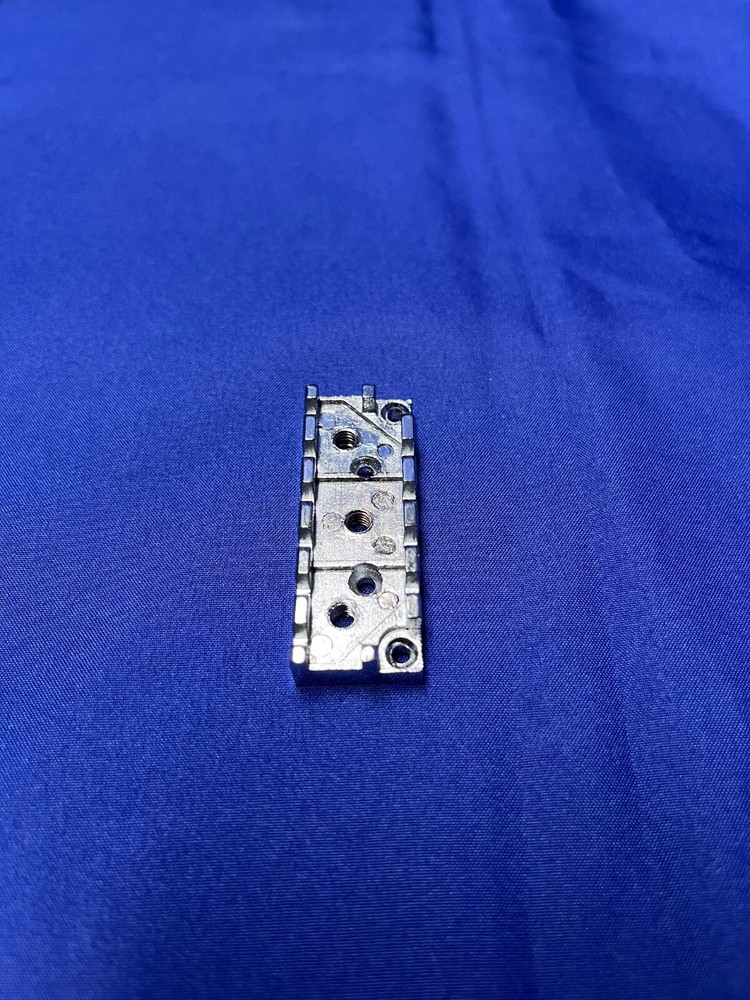 Locking Nut Wide Silver Base for an Electric Guitar