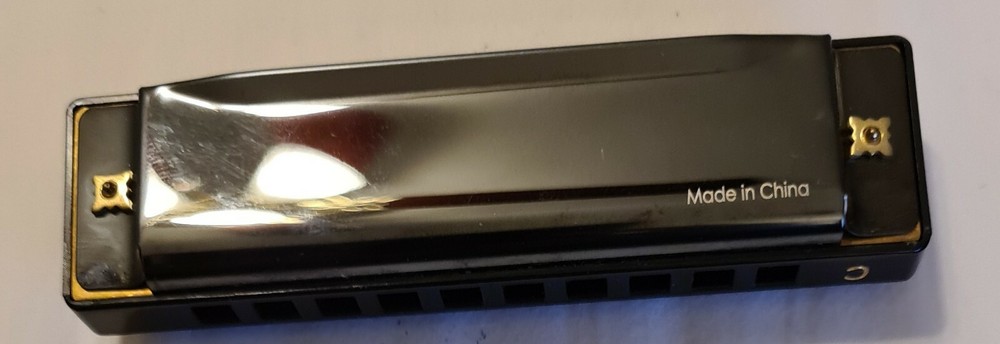 Amosic Harmonica new with box