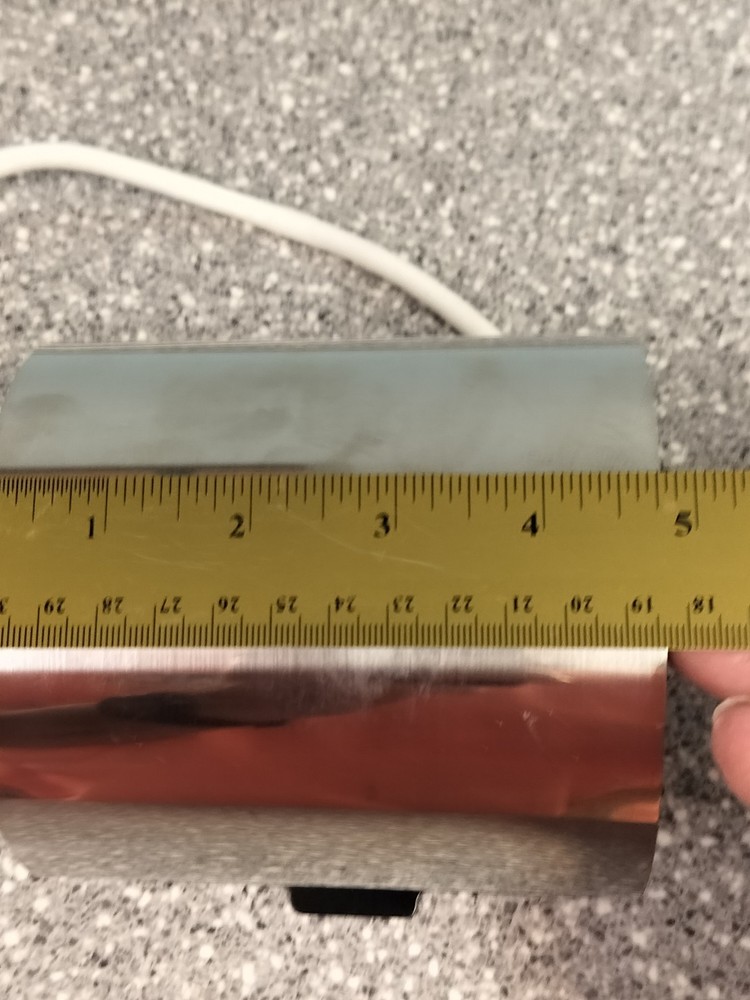 Mug heating element Attached For A Mug Heat Press Machine.