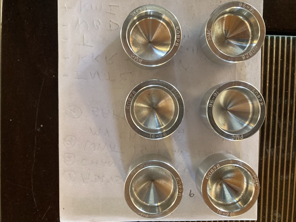 Piston pin plugs