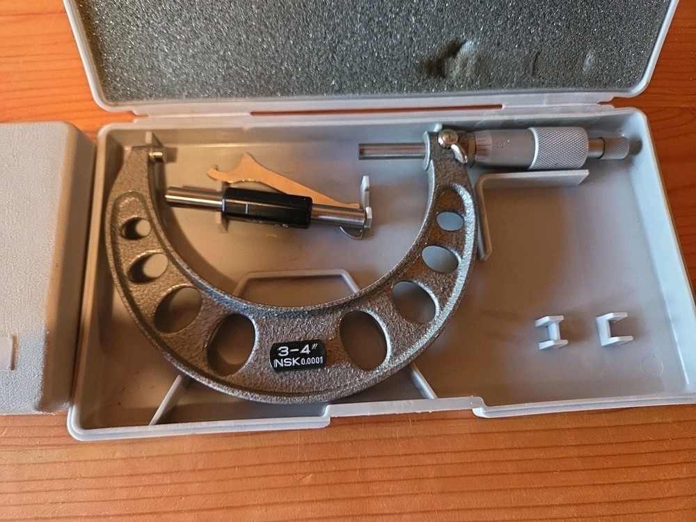 4 Micrometers And A Depth Gauge