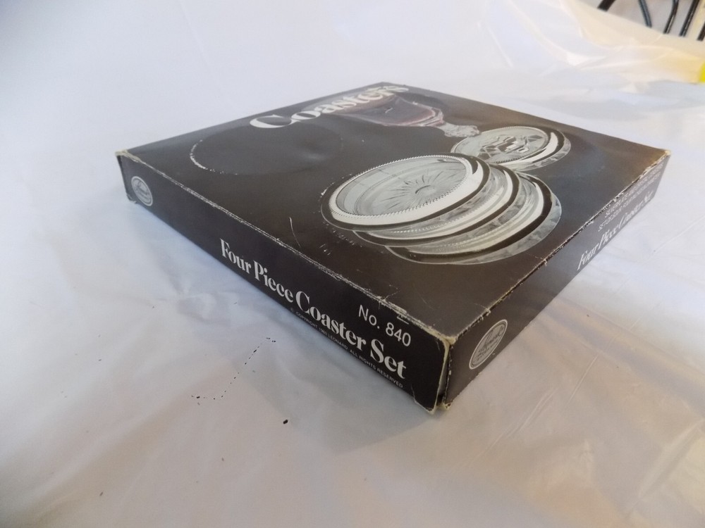 4pc Coaster set Leonard Silver MFG 1980 Coasters still in plastic
