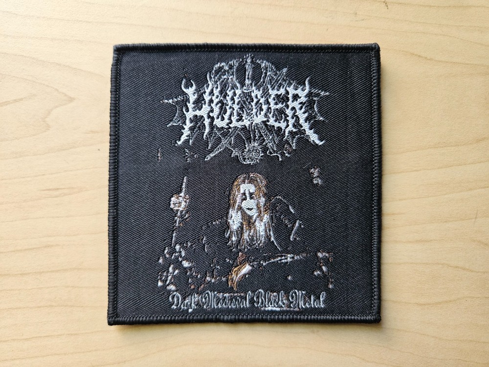 HULDER, SEW ON BLACK BORDER WOVEN PATCH