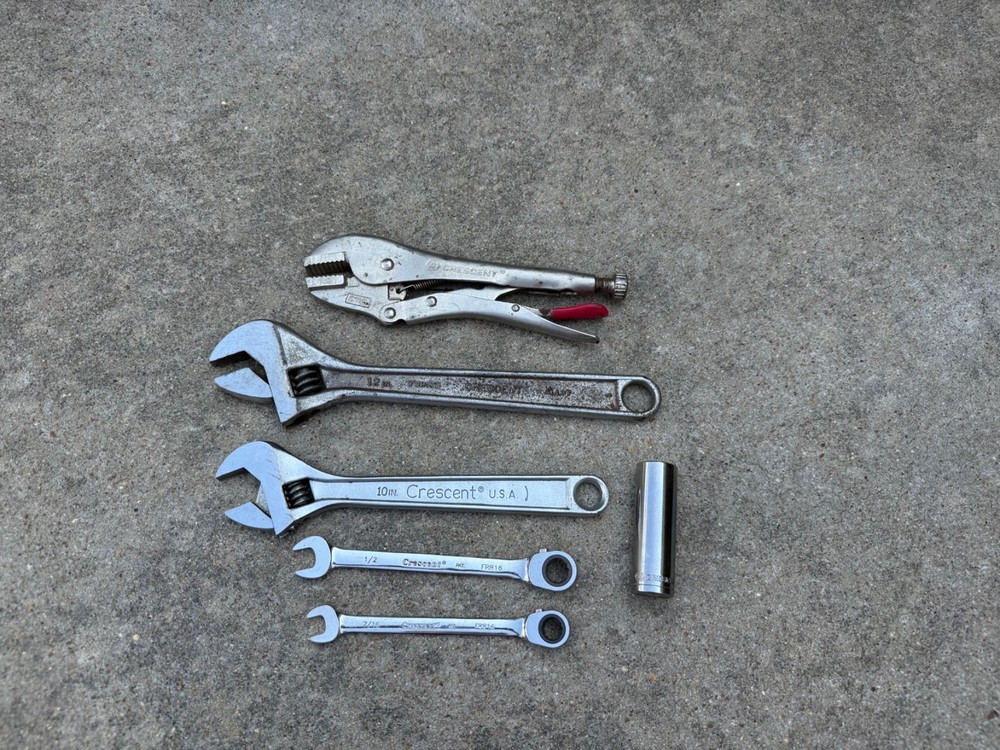 Crescent Tool adjustable wrench, locking plier, two ratcheting wrenches, socket