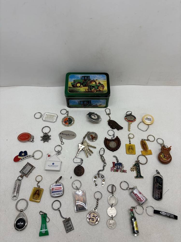32 Vintage Key Chains And a  John Deere Tin Box