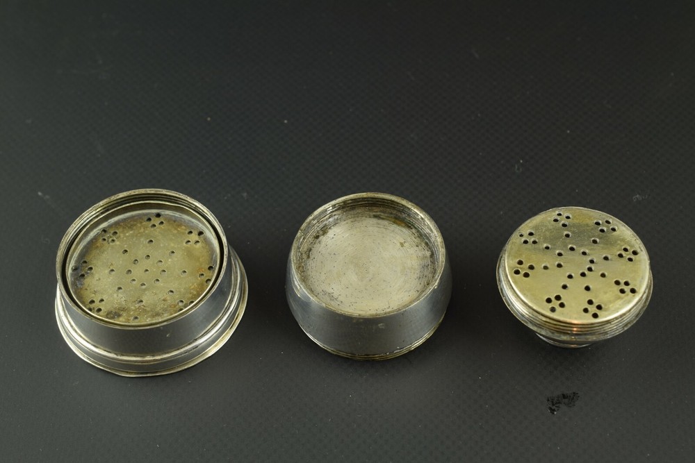 Three-part silver salt shaker or cellar. XIX century.