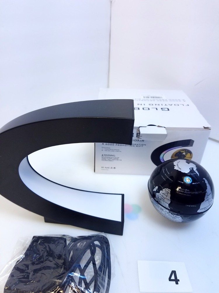 Globe Floating In Midair Black Globe Silver Map Light